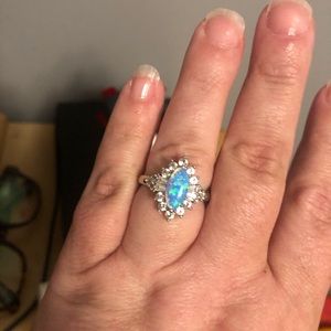 Size 8 Opal ring sterling silver. Never worn. Paid $129 at Zales